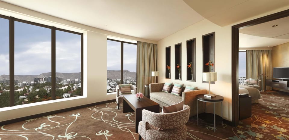 Suite, 1 Bedroom, Club lounge access (City View) | Living area | 37-inch LED TV with satellite channels, TV