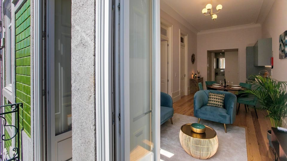 The room opens onto a charming balcony, blending indoor comfort with a refreshing outdoor feel and a glimpse of local architecture.
#LivingRoom #BalconyView #LovelyStay