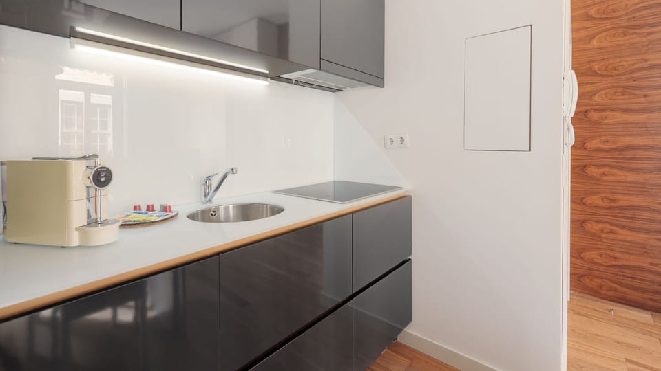 Beautiful and modern kitchen, equipped with all the supplies you might need to cook your homemade meals #modern #stunning #lovelystay #airbnbporto