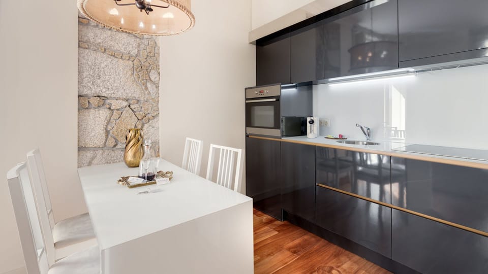 Beautiful and modern kitchen, equipped with all the supplies you might need to cook your homemade meals #modern #stunning #lovelystay #airbnbporto
