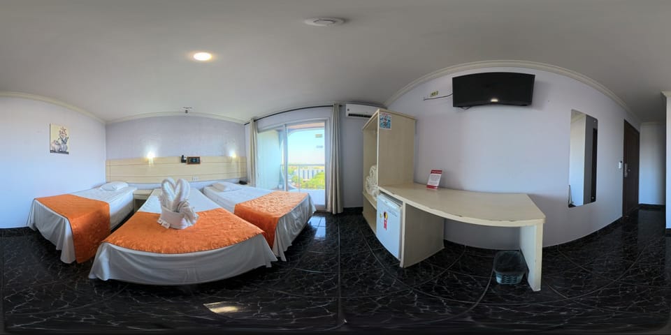 Standard Quadruple Room | Minibar, desk, blackout drapes, free cribs/infant beds