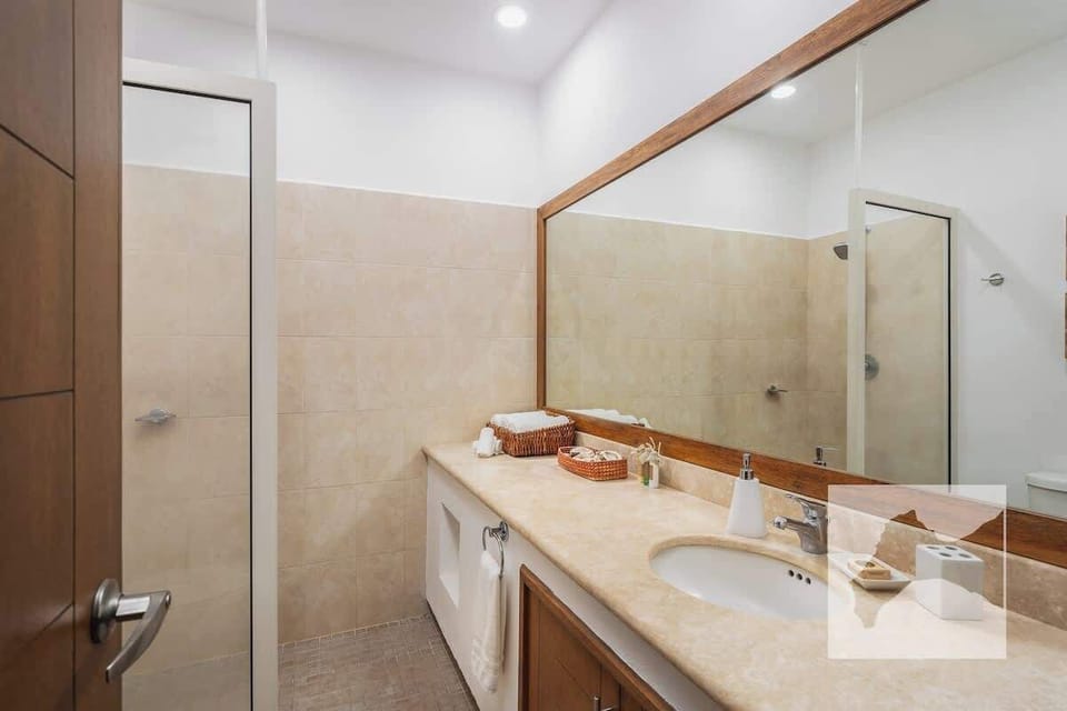 Spa-style bathroom with walk-in rain shower