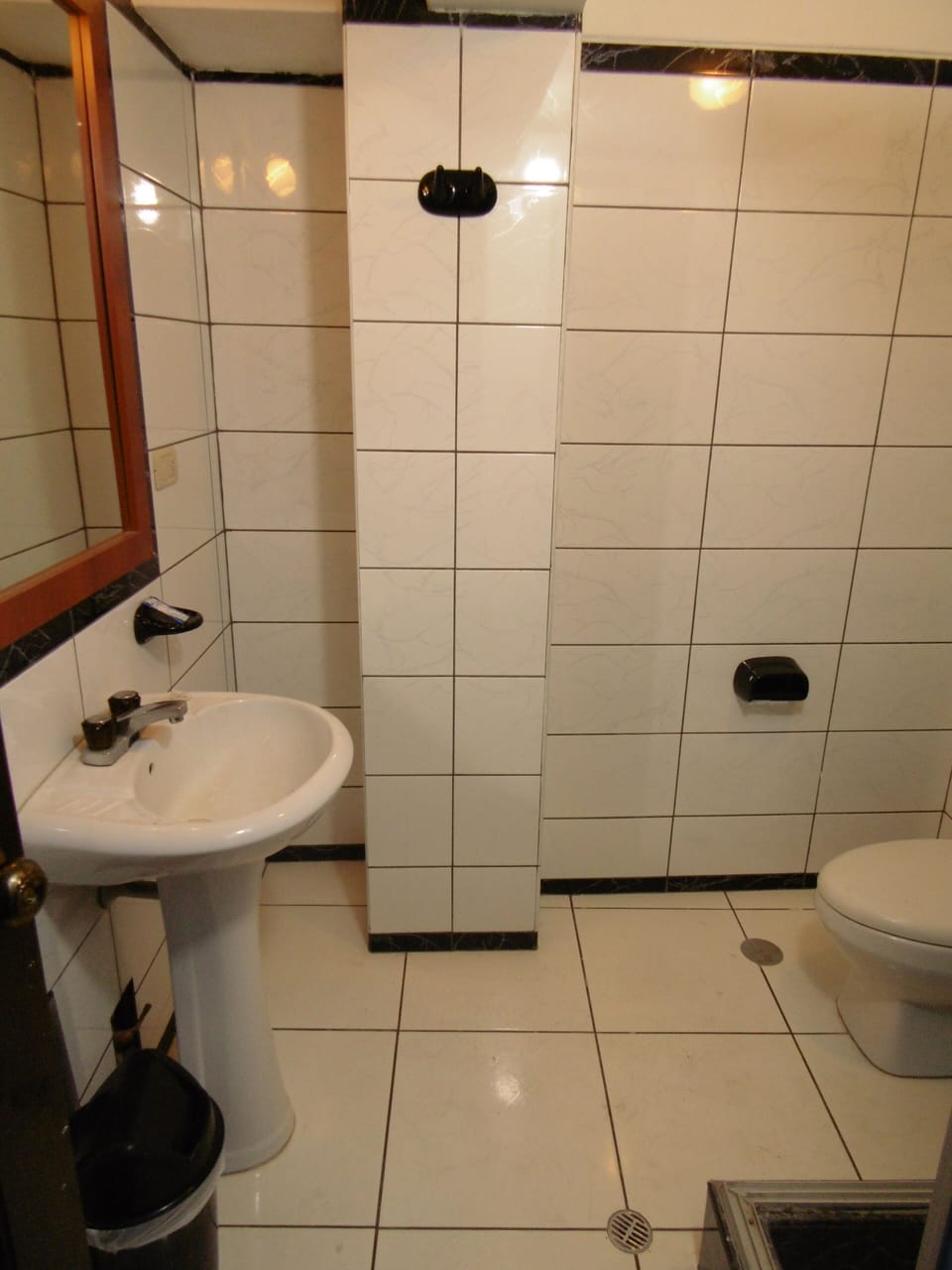 Twin Room | Bathroom | Hair dryer (on request), towels, soap, shampoo