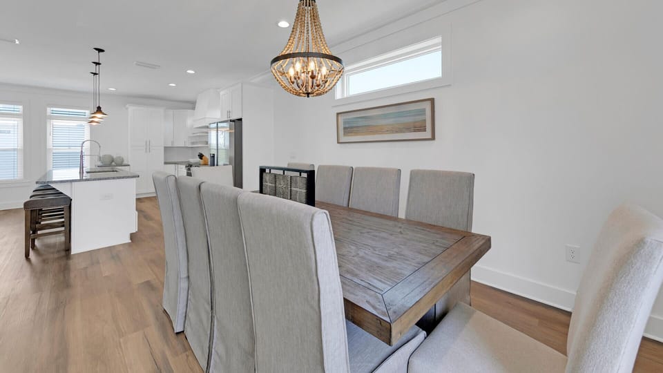 Second Floor Dining Area With Seating For Ten At Table, Four Seats At Bar And Three Seats At Desk Area In Kitchen
