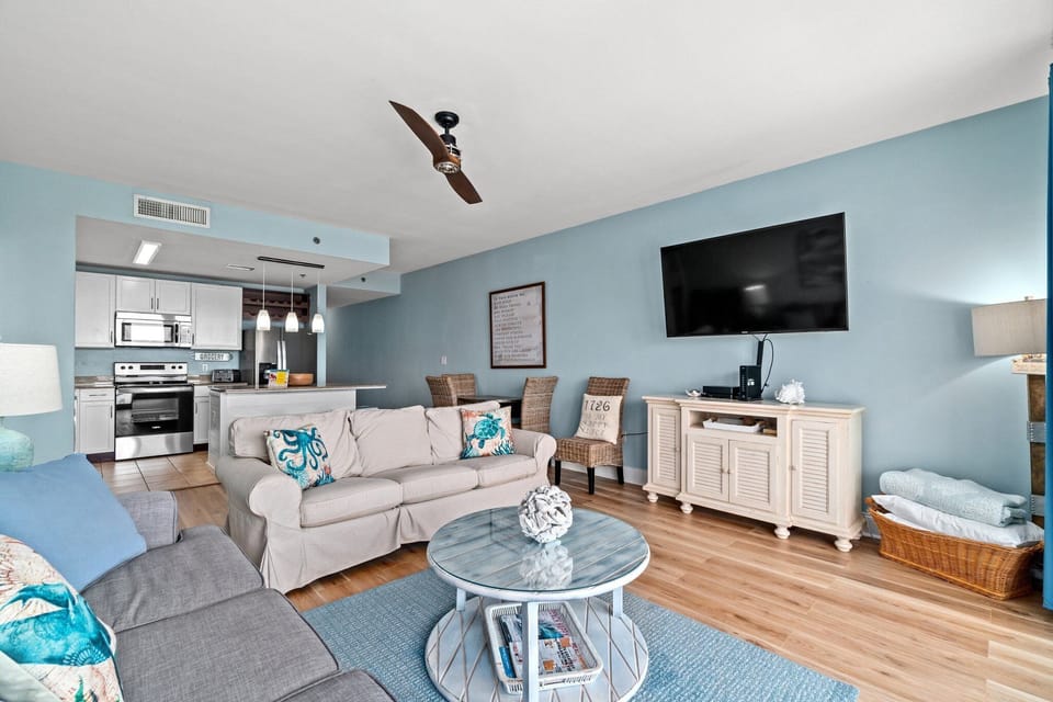  Living room with 50 inch TV equipped with cable, DVD player and DVDS