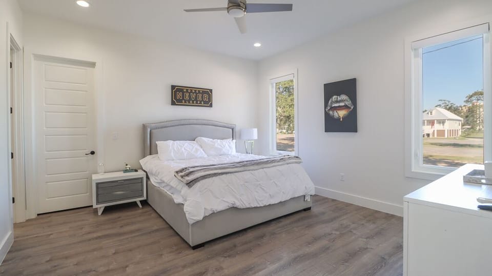 Claim the king room and sleep like the beach wore you out — because it did. This is where the grown-ups win the who-gets-which-bed negotiation.