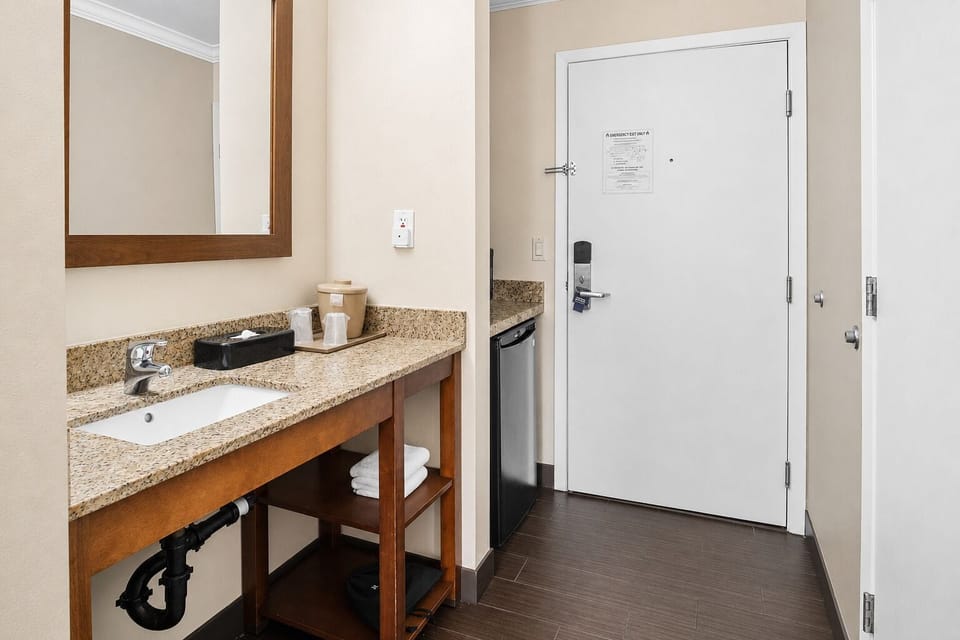 Desk, iron/ironing board, cribs (free), WiFi (free)