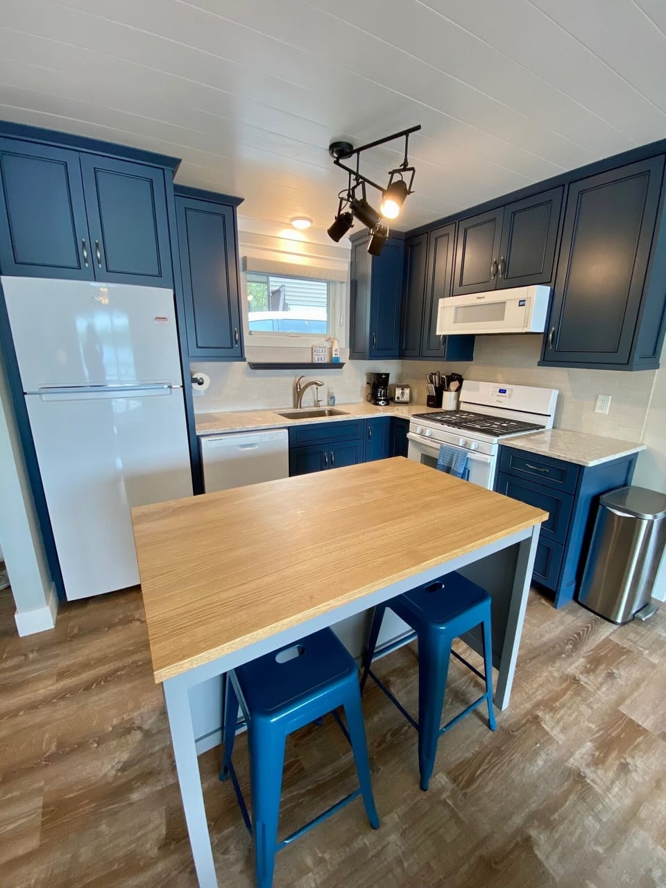 Brand new kitchen with quartz counters, gas stove and fully stocked for guests.