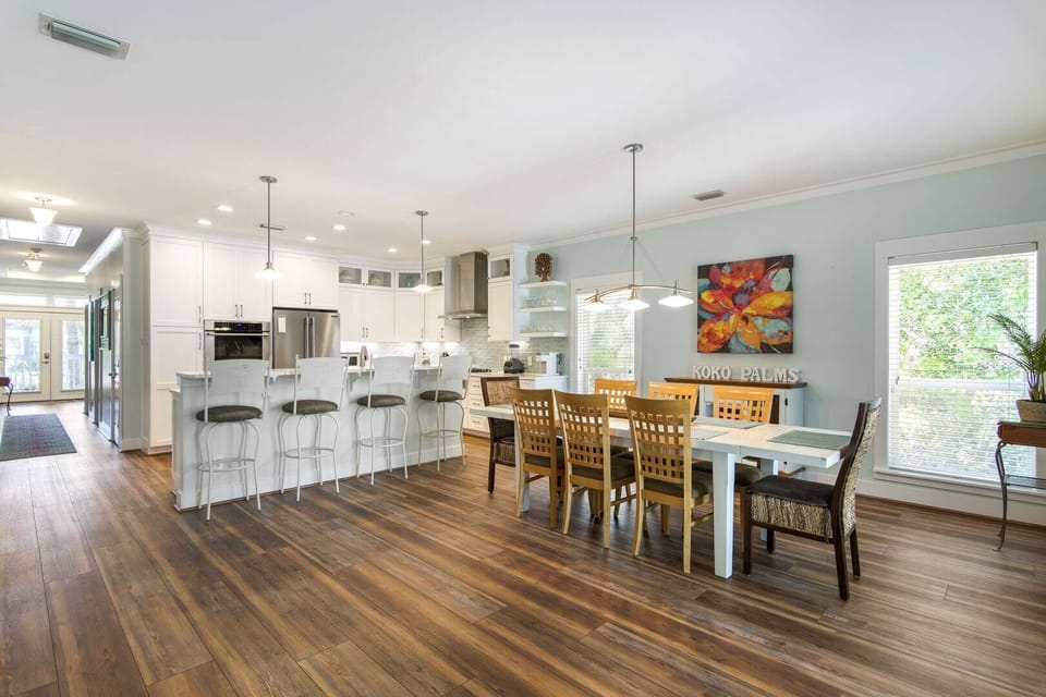 Open kitchen & dining space w/ bright finishes & room to gather