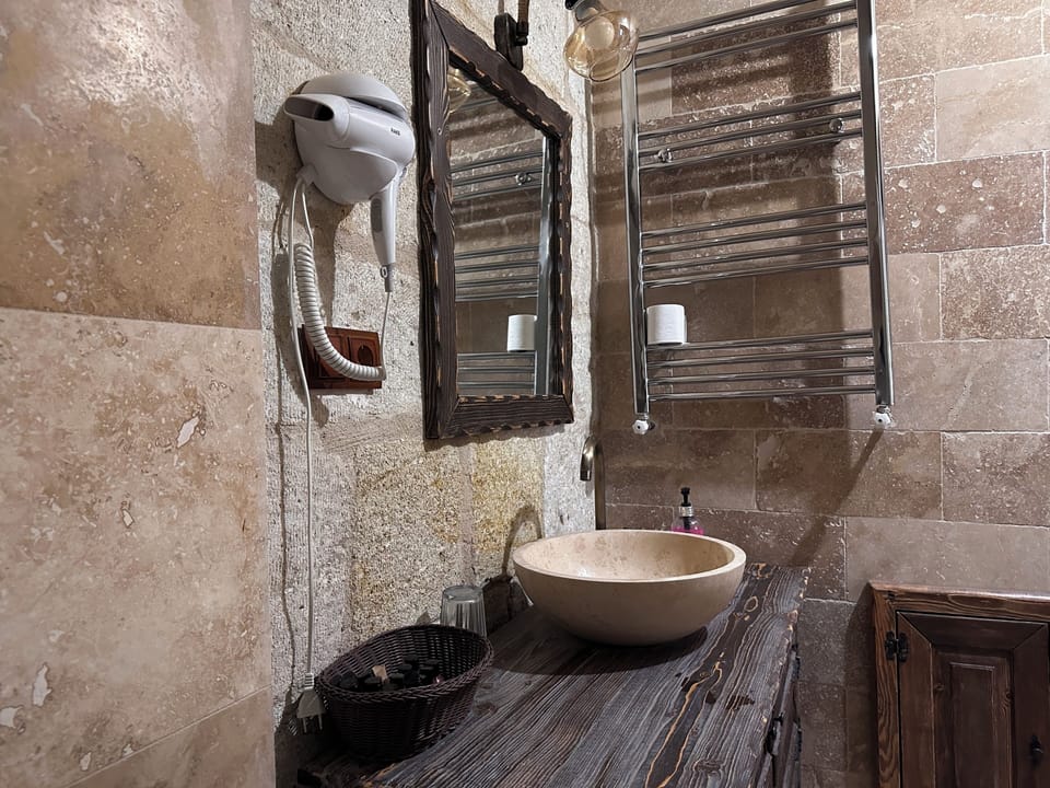 Free toiletries, hair dryer, slippers, heated floors (bathroom)