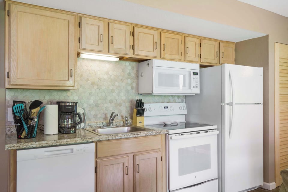 Condo, 1 King Bed, Patio, Garden View (Abby Lane Leisure Time) | Private kitchen | Coffee/tea maker