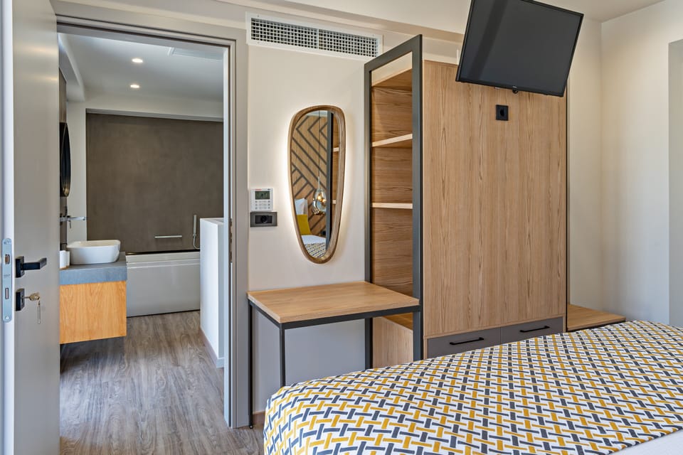 The Master bedroom features an ensuite bathroom with bathtub.