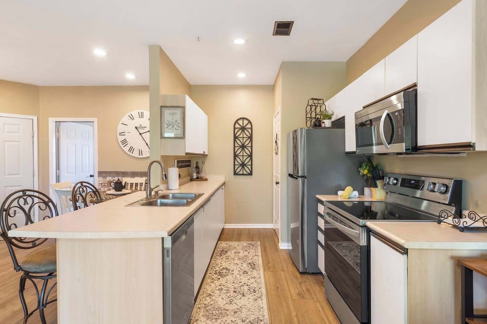 Condo, Multiple Beds, Pool Access, Garden View (Fairview Escape) | Private kitchen | Coffee/tea maker
