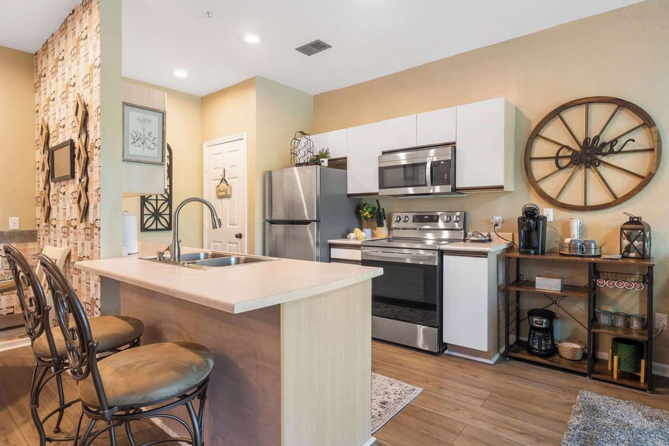 Condo, Multiple Beds, Pool Access, Garden View (Fairview Escape) | Private kitchen | Coffee/tea maker