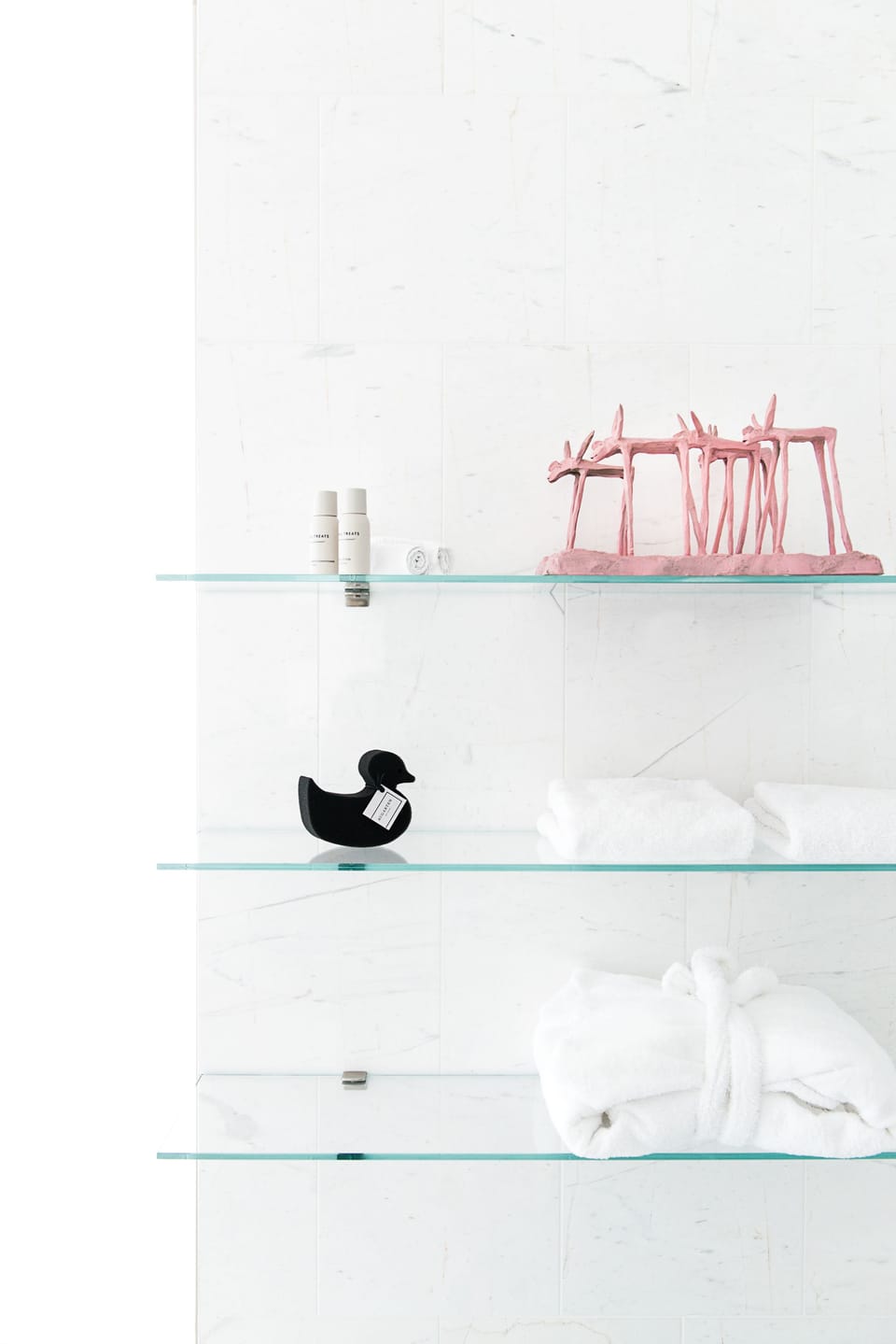 Designer toiletries, hair dryer, bathrobes, slippers