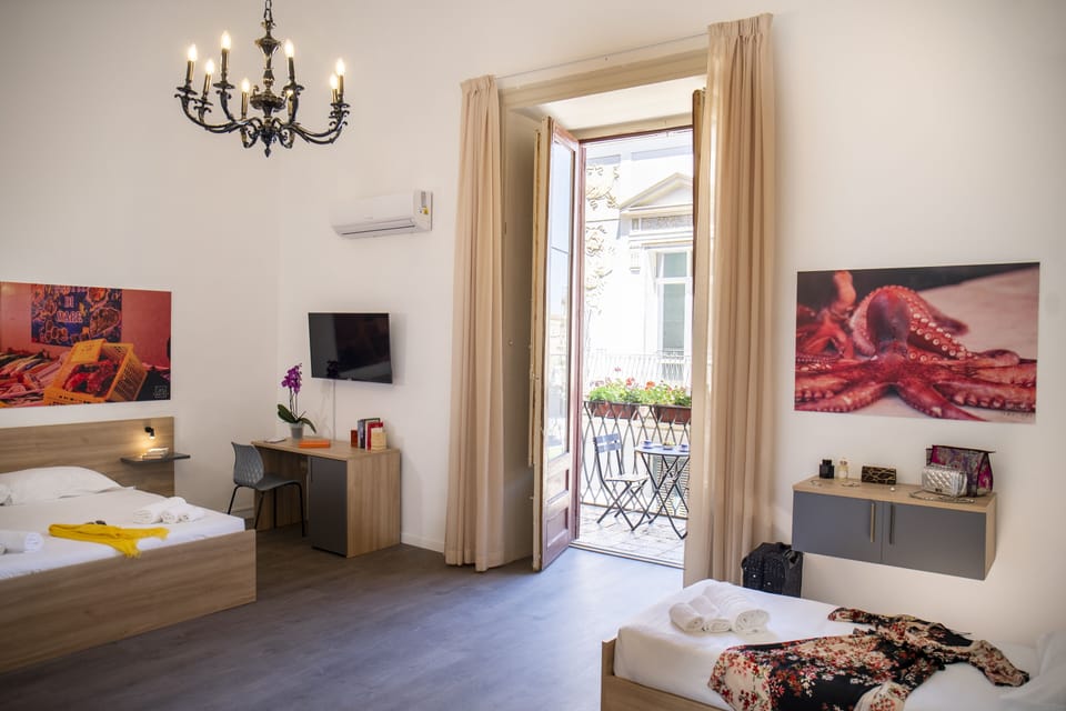 Exclusive Quadruple Room | Bathroom | Shower, rainfall showerhead, free toiletries, hair dryer
