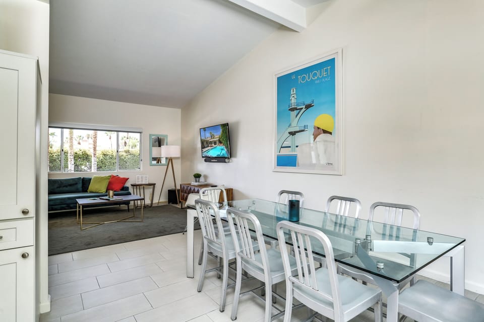 Modern dining area with seating for ten and open living flow