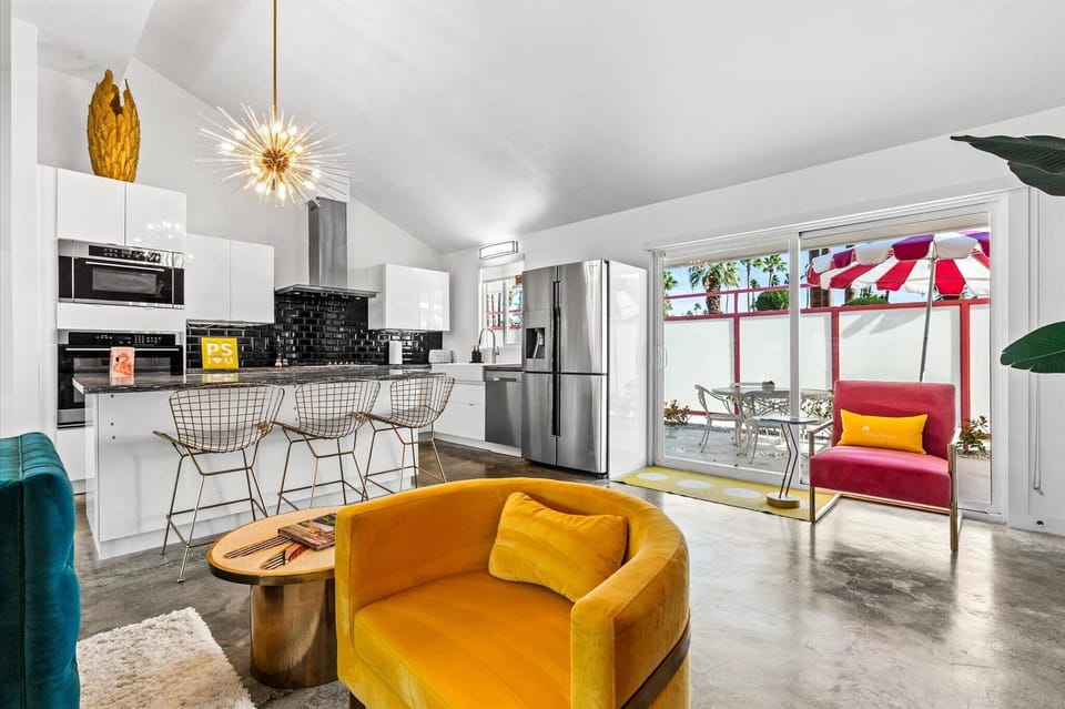 Modern kitchen and lounge with direct access to private outdoor patio