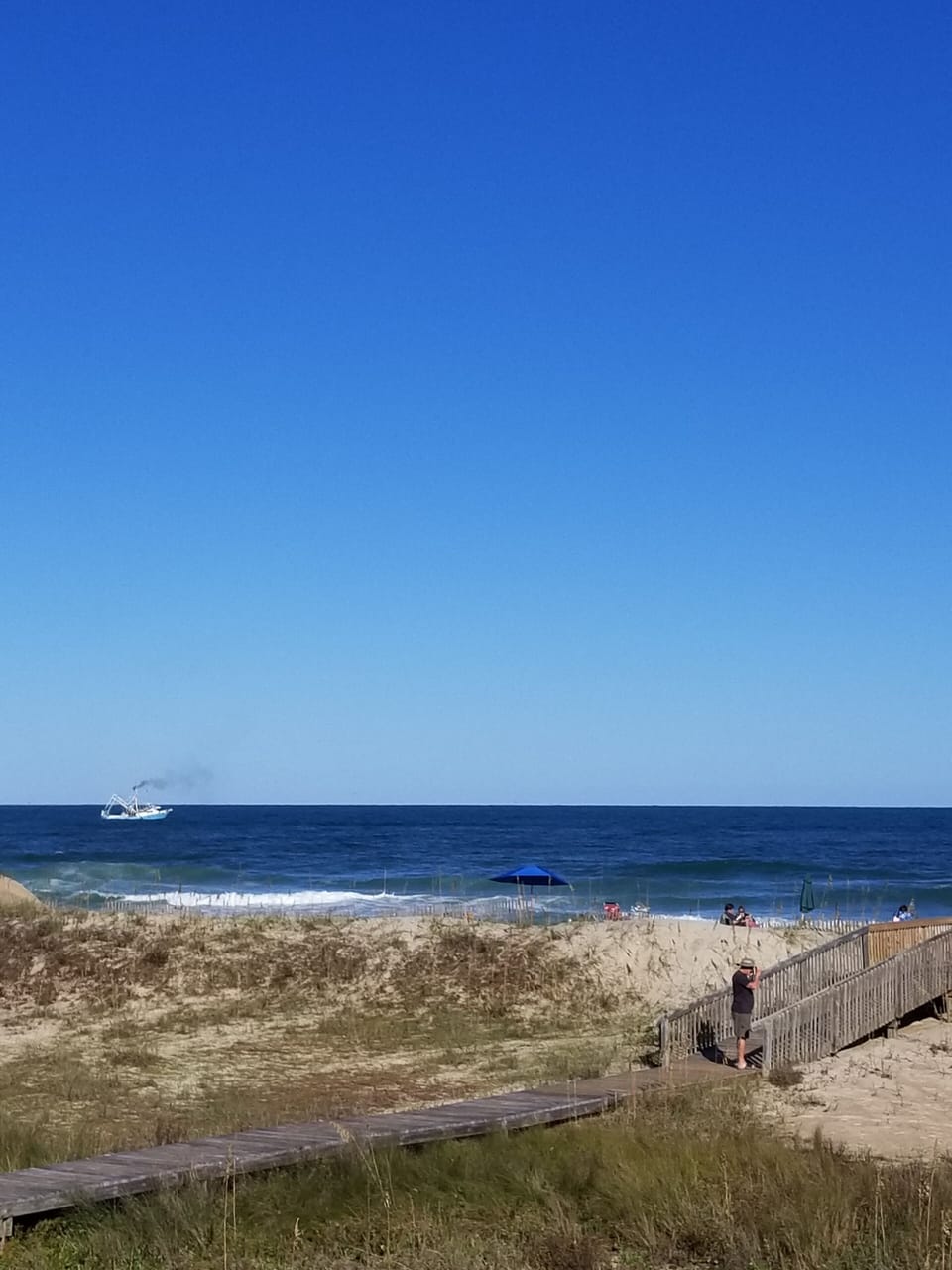 View of ocean from unit deck and boardwalk providing easy access to beach