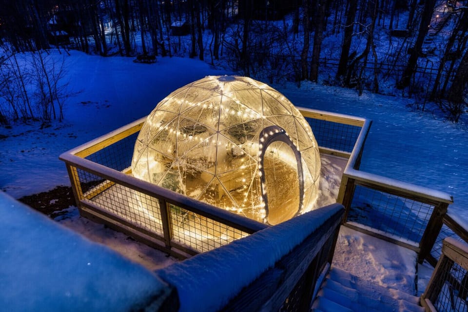 This dreamy cabin features a magical starlit dome on a forested deck, complete with cozy string lights and a telescope for unforgettable nights under the Tennessee sky!