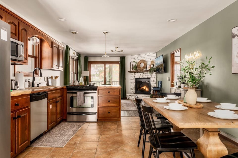 Kitchen: Bright and inviting space with mountain views, perfect for culinary adventures!