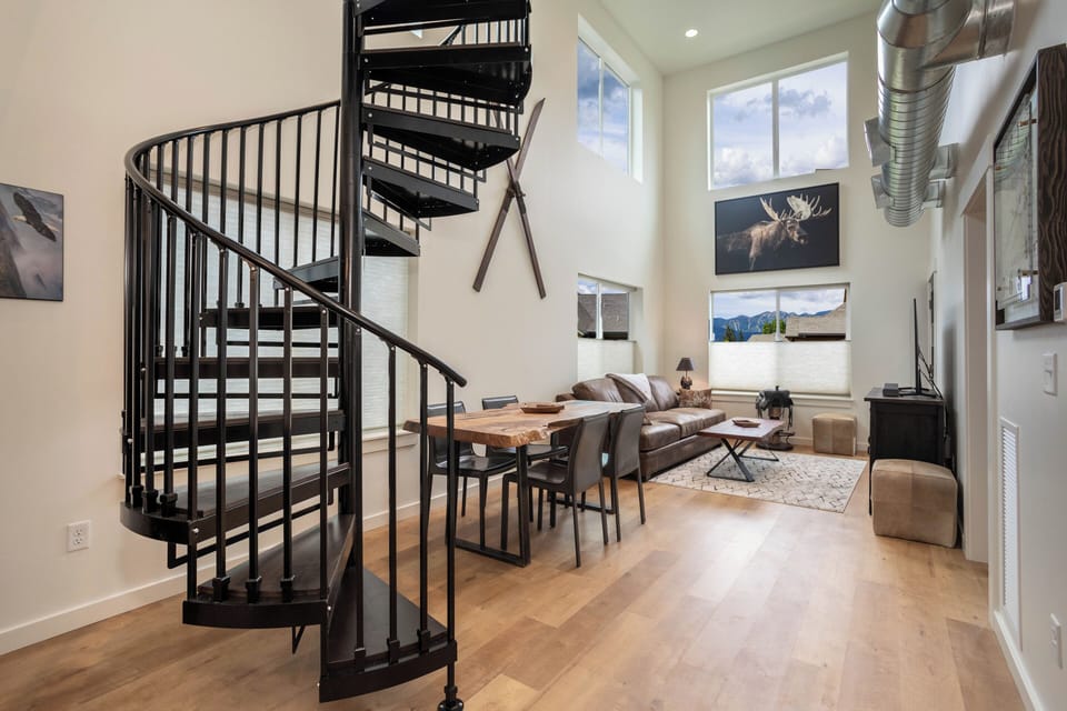 The spiral staircase is fun and ultra-modern! And, check out the views! | Main Level