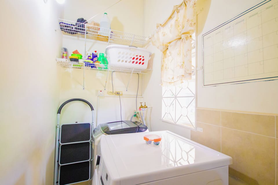 laundry room with washer and dryer