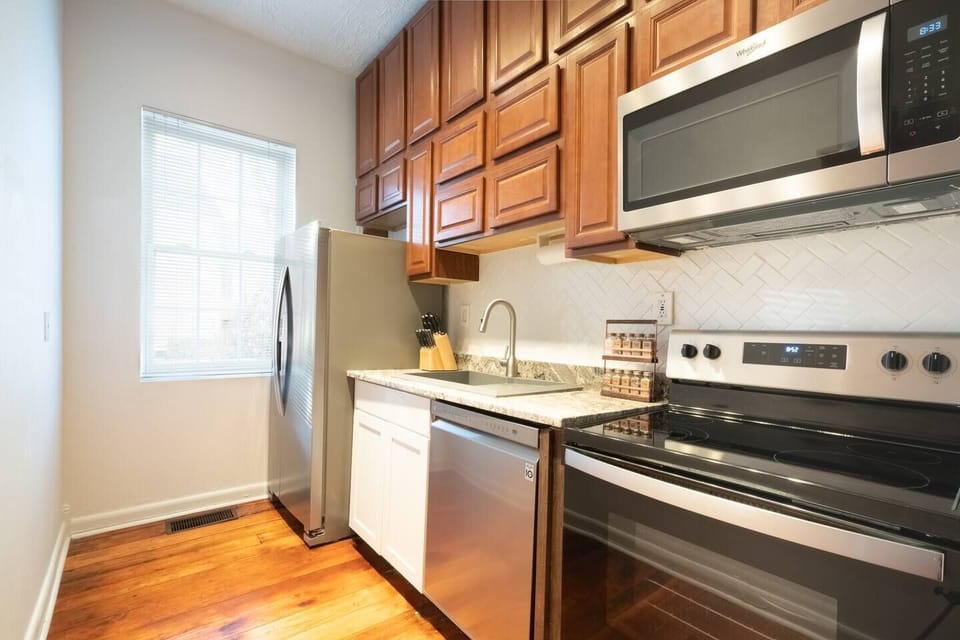 Fully stocked kitchen with everything you may need for a home cooked meal.