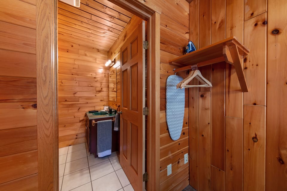 Tabletop and full size ironing boards are provided, as well as shelves + hangers