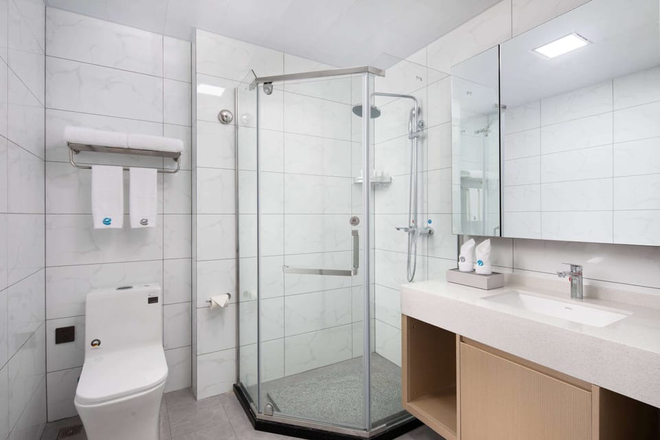 Shower, free toiletries, hair dryer, bathrobes