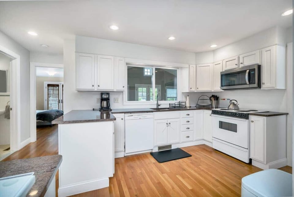 Kitchen with the view of the first bedroom and bathroom