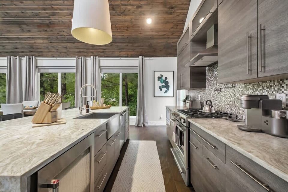 While you're here, enjoy full access to our double-door Frigidaire, 5-ring stove, Keurig, kettle, air fryer, blender, luxury dish ware and more.