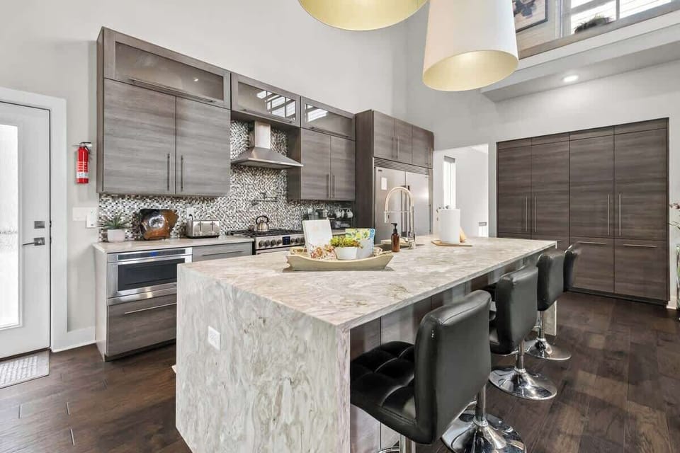 To the right, you'll see our state-of-the-art kitchen.