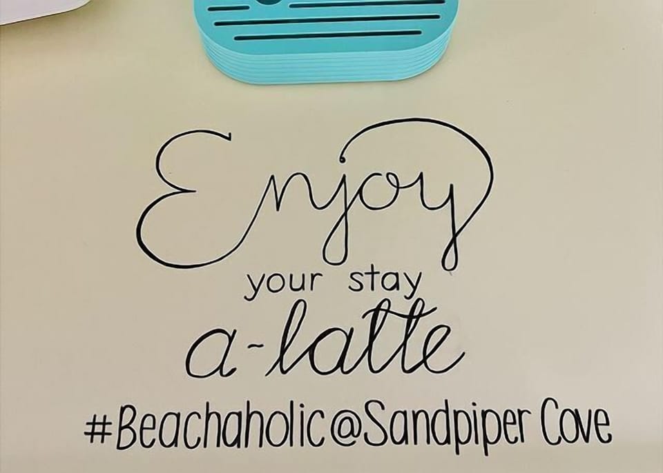 A welcoming message awaits, setting the tone for your relaxing beachside getaway at Sandpiper Cove.