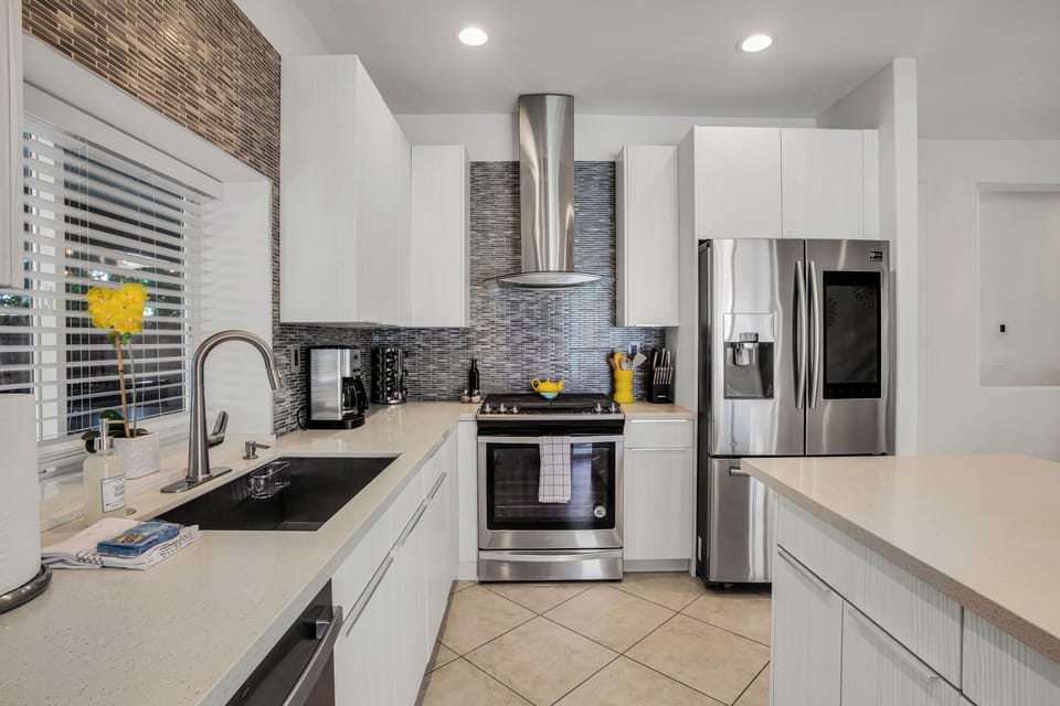 Well-equipped kitchen with stainless appliances and generous counter space