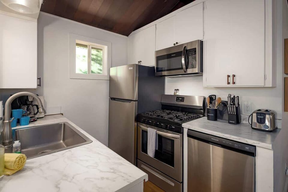 Fully equipped kitchen with stainless appliances