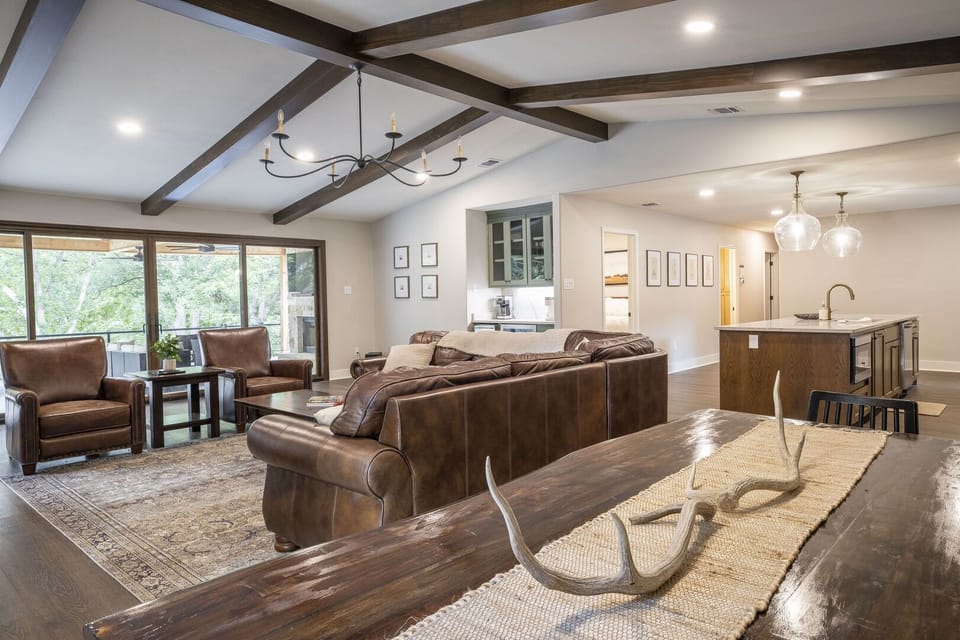 Living room opens to covered porch