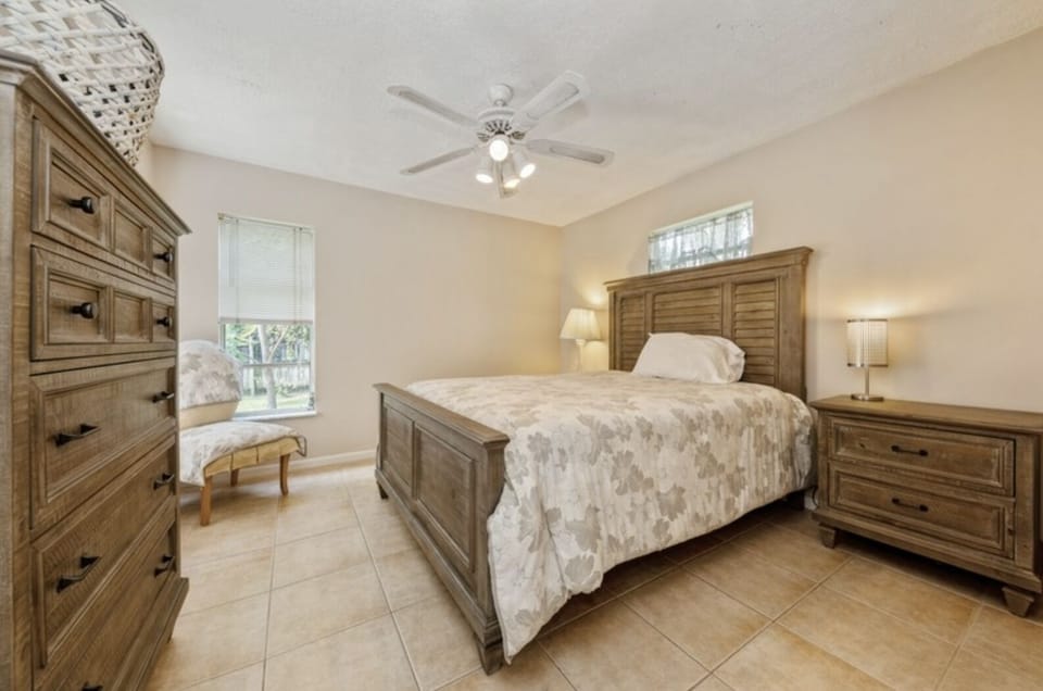 bedroom with a new mattress and furniture and two windows to lock the beautiful 