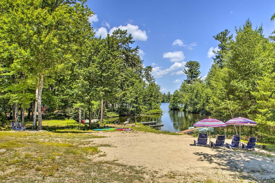 Unwind and reconnect with nature in your private backyard at this spacious cabin on Balch Lake’s quiet shores.