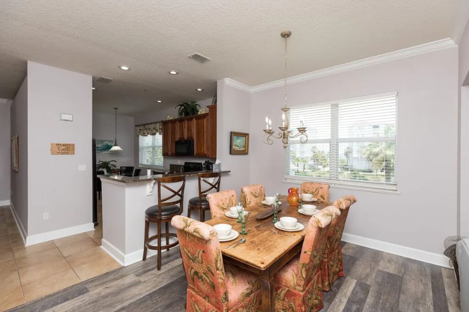 Dining area with breakfast bar behind
