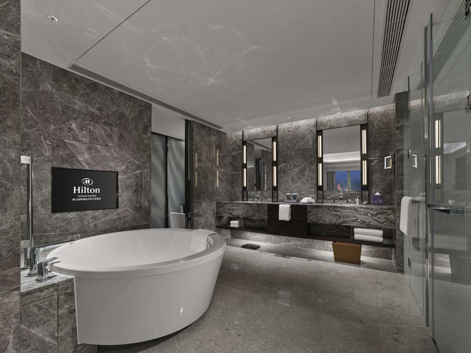 Presidential Suite, 1 King Bed | Bathroom | Separate tub and shower, hair dryer, bathrobes, towels