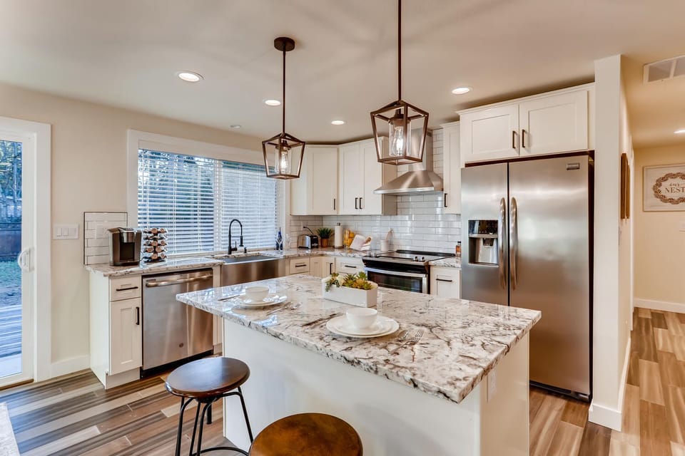 New Kitchen with Granite Counter top and Stainless Steel appliances