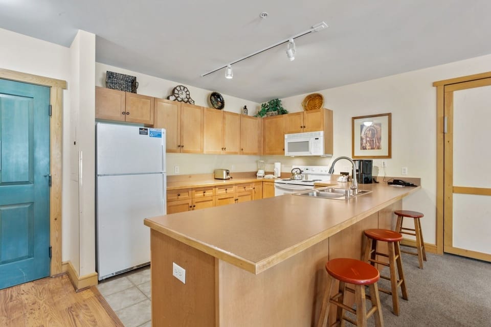 Furniture, Room, Indoors, Kitchen Island, Refrigerator