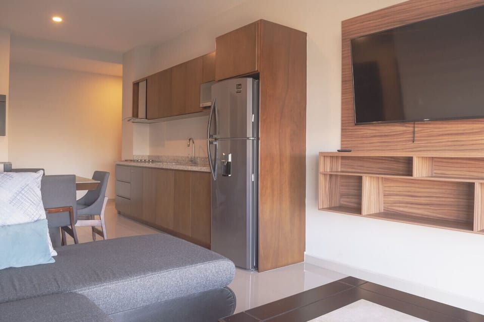 Sala de estar con vista a la cocina