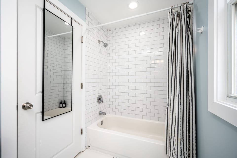 Full sized mirror and recently remodeled bathroom. Necessities provided!