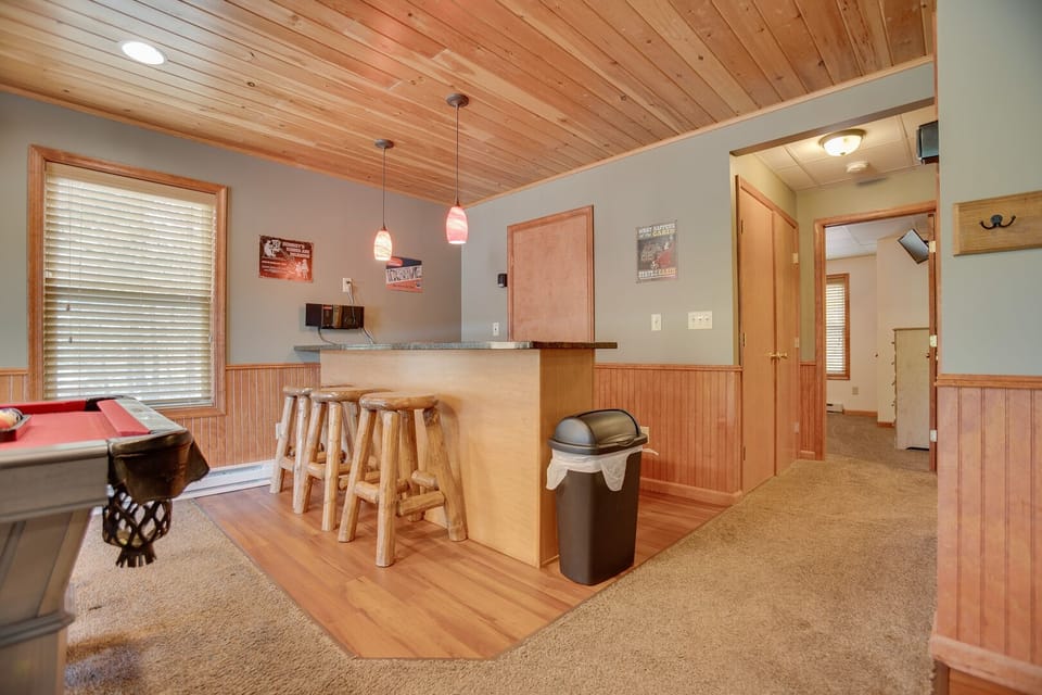 Lounge around the downstairs game room and kitchen area!