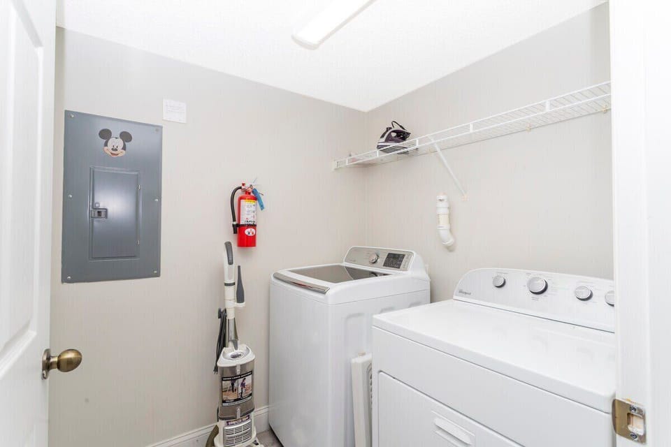 Laundry closet with washer and dryer