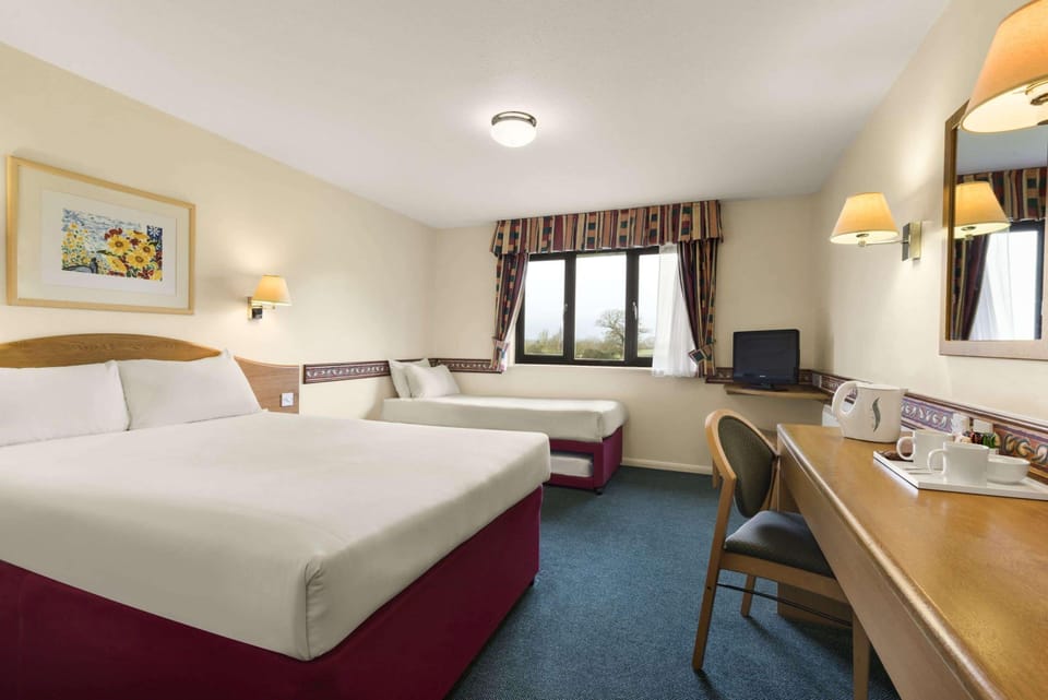 Family Room, Multiple Beds, Non Smoking | Desk, iron/ironing board (on request), WiFi (free), bed sheets