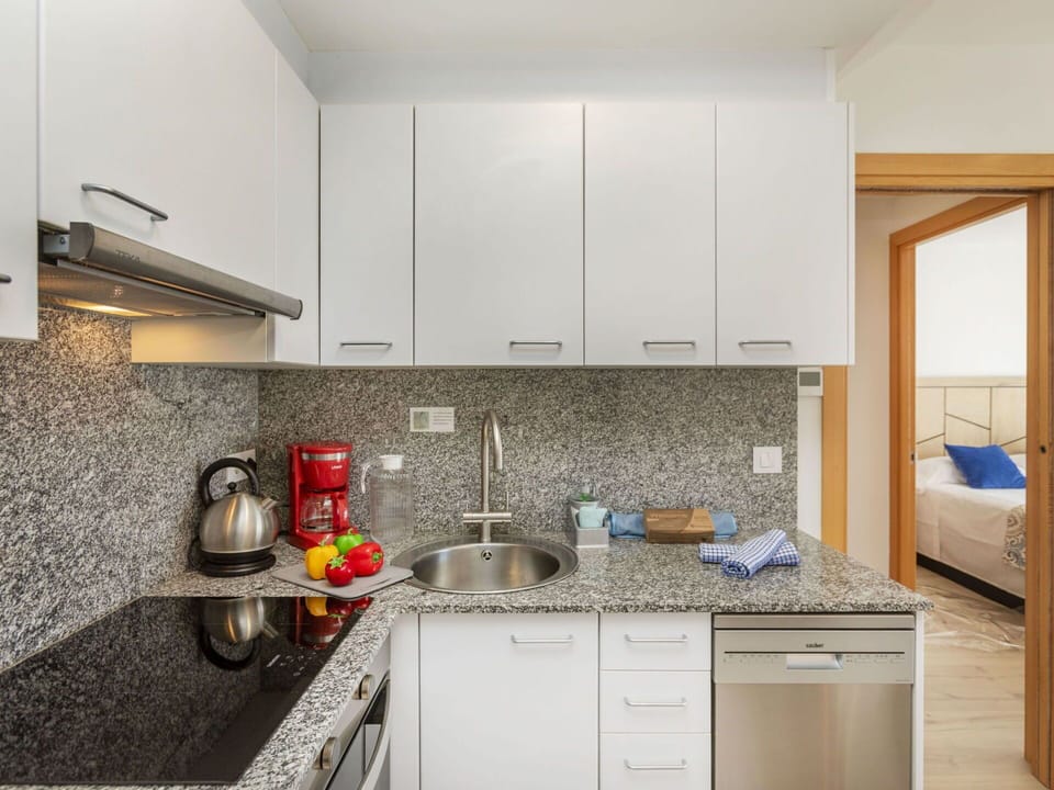 Kitchen, Interior Design, Flooring, Countertop, Wood, Major Appliance, Kitchen Appliance, Floor, Cabinetry, Furniture