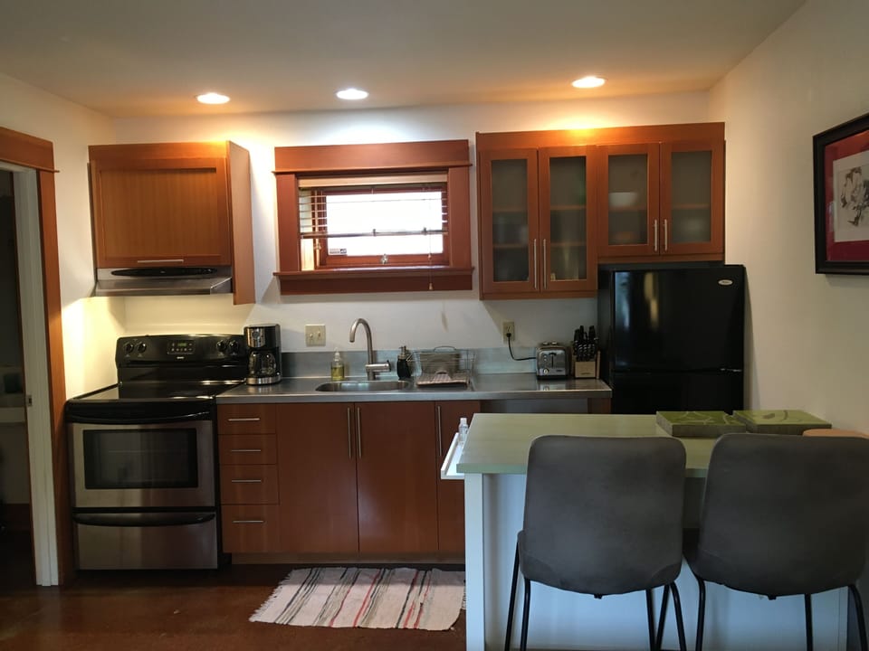 Chef's kitchen with counter-height seats